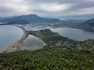 Wetlands Prints: Drone view reveals cloudy skies over Dalyan turtle bay and its surrounding landscape in Turkey
