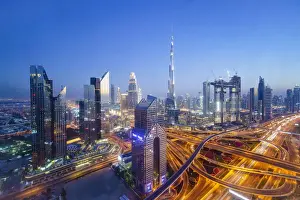 Dubai skyline with Burj Khalifa and Sheikh Zayed Road Interchange, Dubai, United Arab Emirates