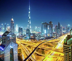 Bustling Prints: Dubai skyline at dusk with Burj Khalifa