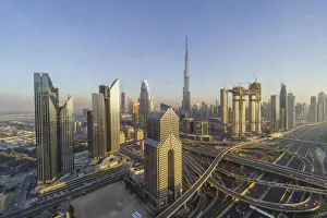 Rush Hour Prints: Dubai skyline and Sheikh Zayed Road Interchange, Dubai, United Arab Emirates Dubai