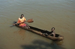 Canoes Prints: Dugout canoe used as ferry, Bonga River, Ethiopia, Africa