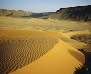 Algerian Prints: Dunes in canyon near Amguid, vehicle in the distance, Algeria, North Africa