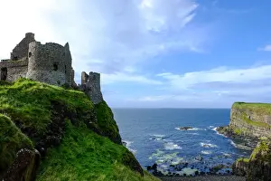 Ulster Prints: Dunluce Castle, located on the edge of a basalt outcropping in County Antrim, Ulster