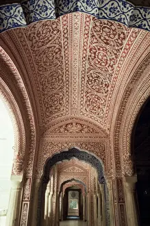 Duo tone intricately hand painted hallway running parallel