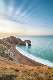 Durdle Door at sunrise, Lulworth Cove, Jurassic Coast, UNESCO World Heritage Site