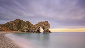 Dusk descends at Durdle Door on the Jurassic Coast, UNESCO World Heritage Site, Dorset