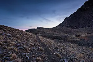 Refuge Prints: Dusk light fades over high mountain ridges and the path to a mountain refuge in Sierra Nevada National Park