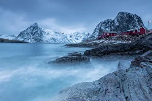 Hamnoy Prints: Dusk light on the typical red houses and rough sea