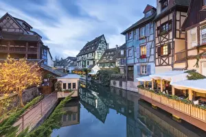 Petite Venise Prints: Dusk lights on houses reflected in River Lauch at Christmas, Petite Venise, Colmar