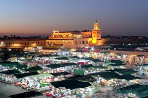 Marrakesh Prints: Dusk lights over the iconic markets in Jemaa el Fna square