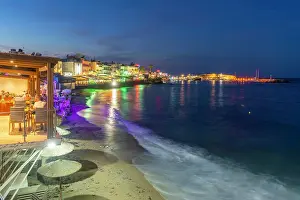 Nightlife Prints: Dusk at Limenas Chersonisou with beach view and town lights in Crete, Greece