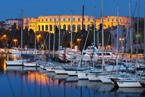 Pula Prints: Dusk over marina and the Roman Amphitheatre, Pula, Istria, Croatia, Adriatic, Europe