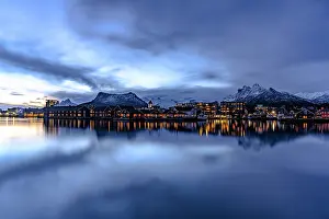 Svolvaer Prints: Dusk time in Svolvaer with town lights reflecting in the sea in Norway's Lofoten Islands