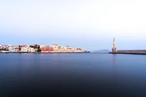 Chania Prints: Dusk over the Venetian lighthouse and harbour of Chania old town, Crete, Greek Islands