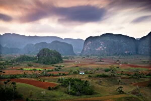 Cuba Gallery: Dusk view across Vinales Valley showing limestone hills known as Mogotes