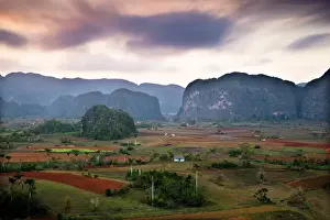 L Imestone Prints: Dusk view across Vinales Valley showing limestone hills known as Mogotes