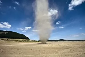 Dust Gallery: Dust whirlwind twister during summer drought on farm, Waikato, North Island, New Zealand, Pacific