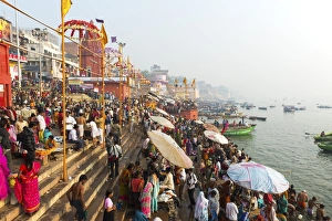 Early morning bathers on the banks of the River Ganges, Varanasi (Benares), Uttar Pradesh