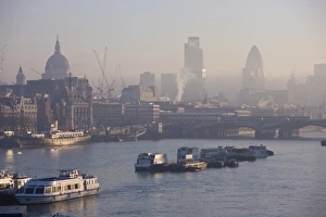 Early Morning Prints: Early morning fog over the City of London skyline, London, England, United Kingdom