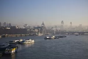 Early morning fog hangs over St. Pauls Cathedral and the City of London skyline