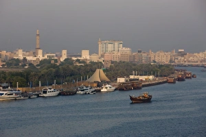 Deira Prints: Early morning light, view of Dubai Creek, Deira, traditional dhow, Dubai