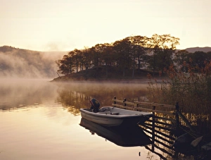 Generic Location Prints: Early morning mist and boat, Derwent Water, Lake District, Cumbria, England
