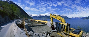 Construction Prints: Earth moving machinery used for widening Route 13 along