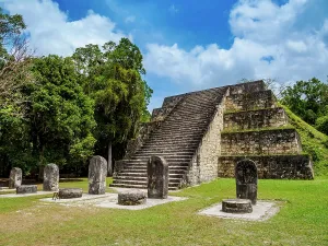Step Prints: East pyramid of Group Q with stone stelae in Tikal