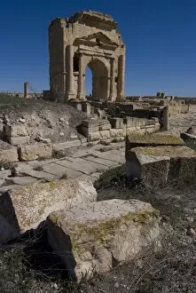 Images Dated 25th March 2008: East-west road, with Arch of Trajan behind, Roman ruins of Makhtar, Tunisia