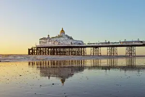 Eastbourne Prints: Eastbourne Pier at sunrise, constructed in the 1870s and a Grade II* listed structure