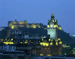 Images Dated 8th April 2008: Edinburgh Castle and the Waverley Hotel clock tower illuminated at dusk