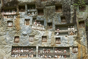 Toraja Prints: Effigies of the dead in cliffs, Toraja cemetery, Lemo, Tana Toraja, Toraja