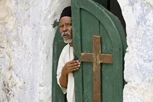 Images Dated 27th September 2007: Egyptian Coptic priest at the Holy Sepulchre, Jerusalem, Israel, Middle East