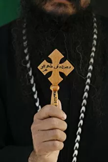 Images Dated 18th September 2007: Egyptian Orthodox Coptic priest showing cross, Jerusalem, Israel, Middle East