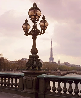 Pari Prints: The Eiffel Tower seen from the Pont Alexandre III at dusk, Paris, France