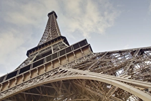 Metalwork Prints: The Eiffel Tower towers overhead, Paris, France, Europe