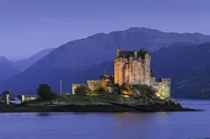 Images Dated 12th September 2009: Eilean Donan Castle floodlit at night on Loch Duich, Scotland, United Kingdom, Europe