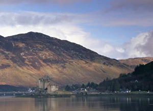 Duich Prints: Eilean Donan castle reflected in the calm water of