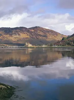 Duich Prints: Eilean Donan castle reflected in calm water of Loch Duich from Totaig
