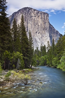 El Capitan, a 3000 feet granite monolith, with the Merced River flowing through Yosemite Valley