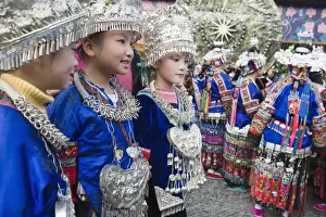 New Year Prints: Elaborate costumes worn at a traditional Miao New Year festival in Xijiang
