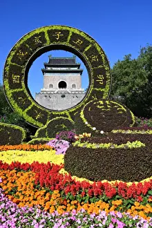 Beijing Prints: Elaborate floral decorations celebrating 70 years of China framing the Bell Tower