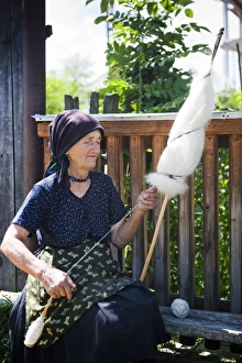 Spinning Prints: Elderly woman spinning wool, Ieud, Maramures, Romania, Europe