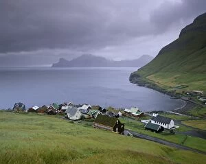Images Dated 21st September 2009: Elduvik village, view over Funningsfjordur and Kalsoy cliffs in the distance