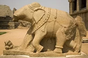 An elephant sculpture, with a broken trunk, adorns the royal Elephant Stables at Hampi
