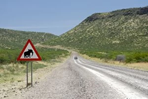 Elephant sign along dirt road, Namibia, Africa