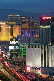 Hotels Prints: Elevated dusk view of the hotels and casinos along the Strip