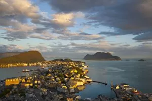 Images Dated 19th June 2009: Elevated view over Alesund illuminated at sunset, Sunnmore, More og Romsdal, Norway, Scandinavia