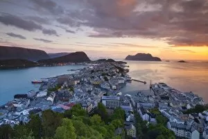 Images Dated 18th June 2009: Elevated view over Alesund illuminated at sunset, Sunnmore, More og Romsdal, Norway, Scandinavia