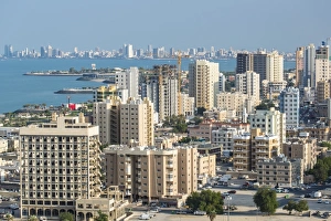 Persian Gulf Prints: Elevated view of the city skyline and residential suburbs